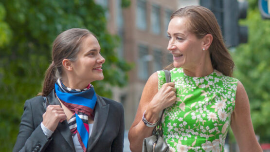 2 women talking outside